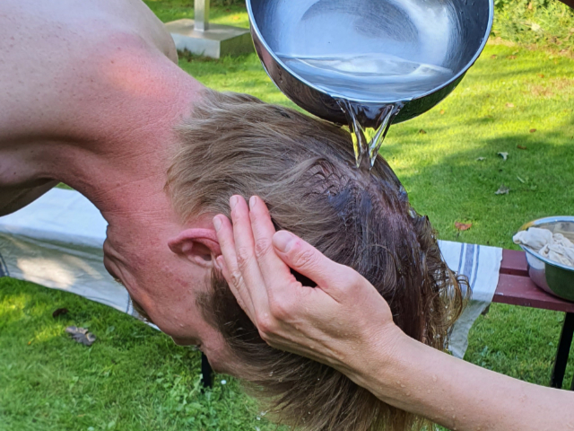 Pouring water over the head